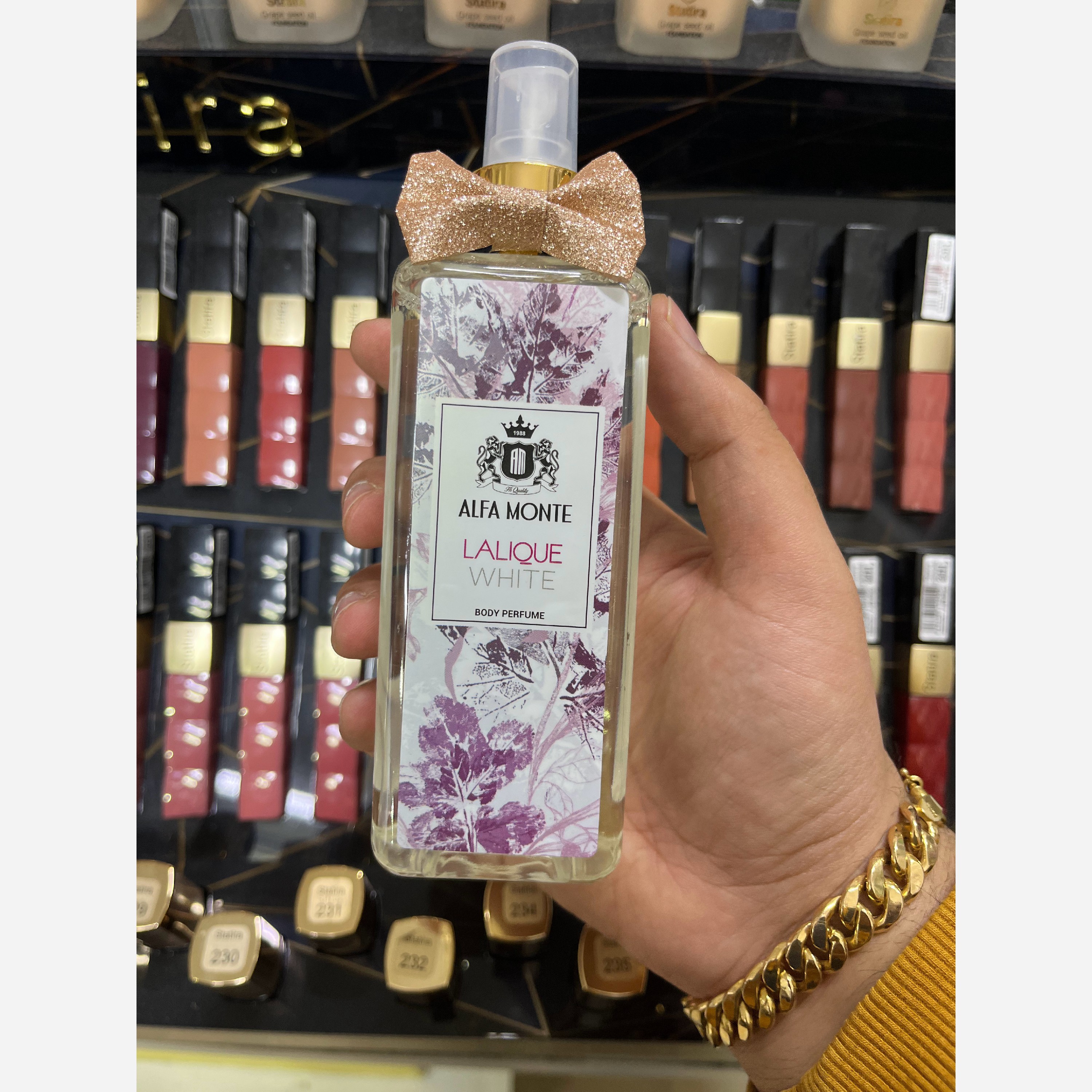 بادی پرفیوم مردانه لالیک وایت (لالیک سفید) (Lalique White) آلفامونته با رایحه خنک